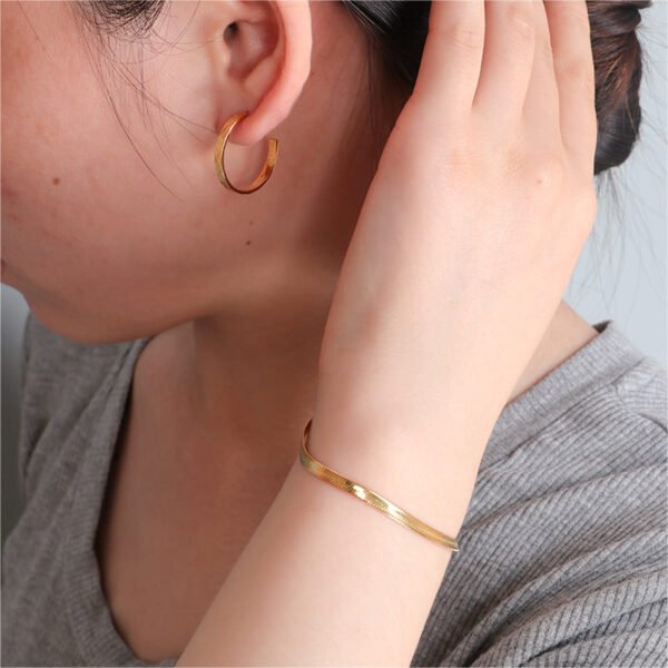 Small Gold Hammered Open Hoop Earrings - Image 4