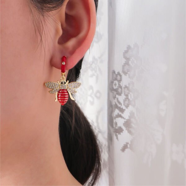 Gold Bee Enamel Dangle Huggie Earrings - Image 3